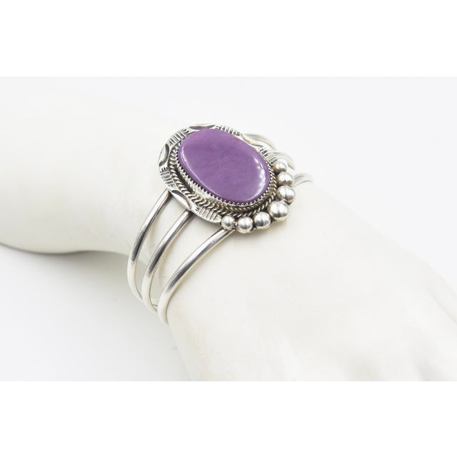 This is part of Chairish’s Costume Jewelry assortment. An impressive Navajo-inspired bracelet by Arizona silversmith Kay...