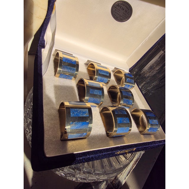 Great looking set of vintage lapis inlay napkin rings from Chile. The metal isn't marked and appears to have a slightly...