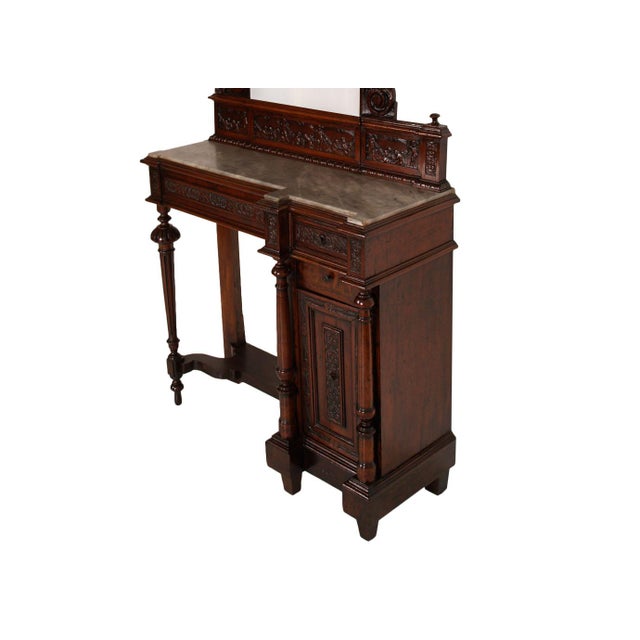 Exceptional and highly sculptural venetian vanity console in carved walnut, dating from the late 19th century, retaining...