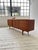 This beautiful design by HP Hansen is made entirely of teak and offers plenty of storage space, two sliding doors, four...