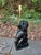 A playful pair of vintage ceramic dog lamps with expressive faces and a glossy black finish. Each dog sits on a newly...