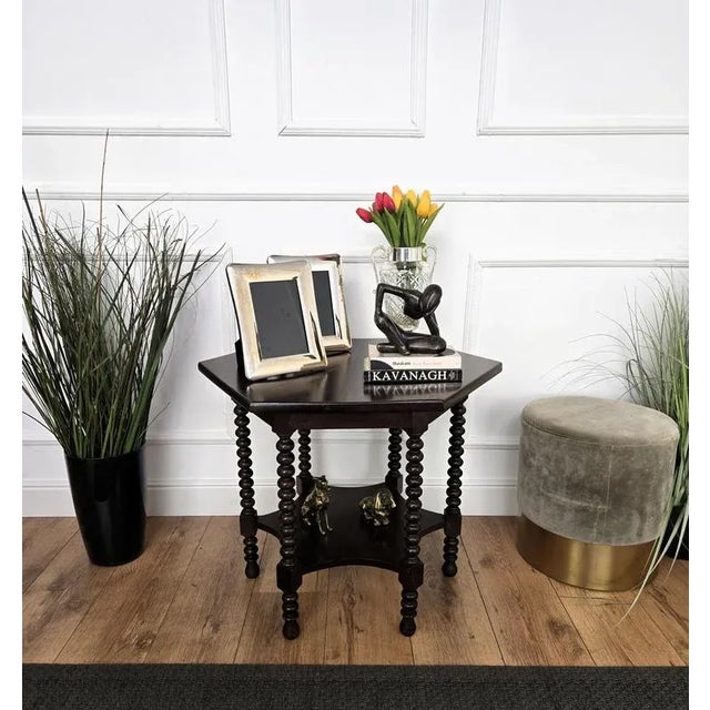 Beautiful antique Italian solid walnut side or coffee table, features hexagonal top with beveled edges over six...