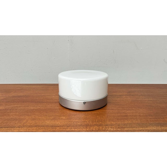 Mid-century modern minimalist flush mount by slo sähköliikkeiden oy, finland. a simple ceiling light from the time of...