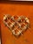 Design Plus Gallery presents Warm Golden Heart by Linda Tomoko Mihara. This is her piece made of multiple origami cranes...