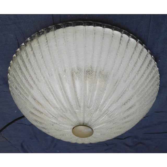 Vintage Italian flush mount with a single large textured clear Murano glass diffuser hand blown in Graniglia technique,...