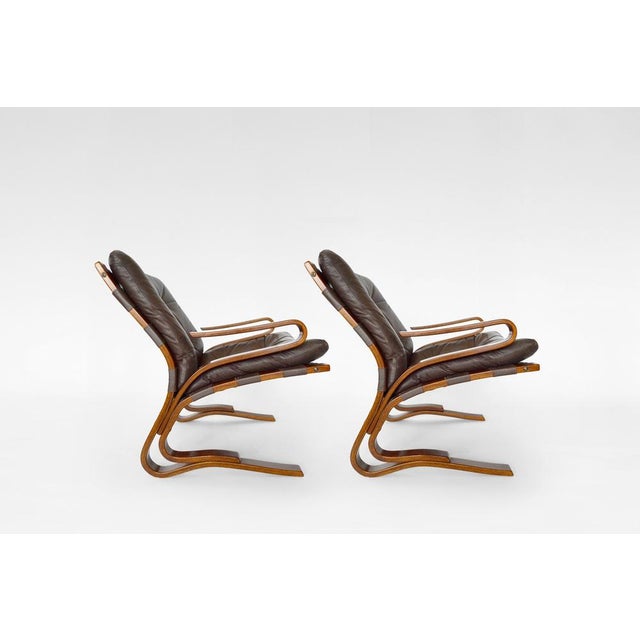 A fantastic condition vintage low-back Kengu armchairs. Designed by Elsa&Nordahl Solheim and manufactured by Rybo Rykken &...