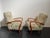 Elegant pair of 1960s Italian armchairs in orange-stained beech, with armrests featuring distinctive dowel joints....