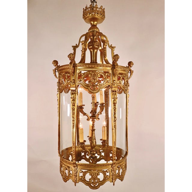 This magnificent gilt bronze cylindrical lantern is one of a kind. The bronze pieces were cast and cut by hand, making...