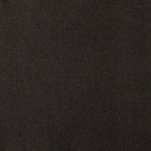 With a shimmery faux-shagreen finish on a natural linen ground, this durable upholstery-ready fabric is also enduringly...