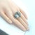 This is an authentic large 3 gemstone ring by John Hardy, it is crafted from sterling silver featuring a long cushion cut...