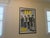 This item is a vintage framed poster featuring the American rock band R.E.M. Subject: The poster displays a black and...