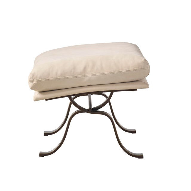 Immerse yourself in Mid-Century Italian luxury with our lounge chair and ottoman.The one piece seat and back are...