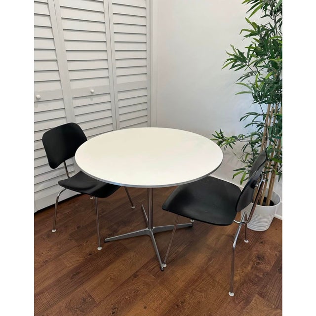 Model: A223 Tabletop: Fenix / White Edge: Aluminium / Brushed - Matt Base: Aluminium / Brushed - Matt Fritz Hansen’s Table...