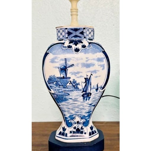 Add timeless charm to your space with this beautiful pair of vintage Mid-Century Modern Delft-style table lamps. Featuring...