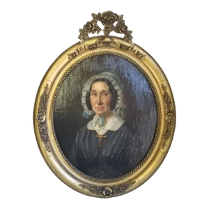 Antique Portrait of a Woman in a Gold Frame