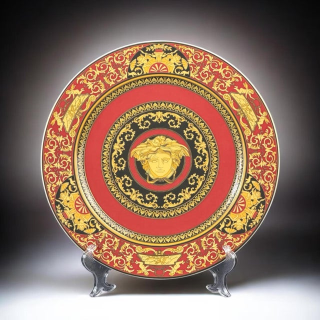 Exceptional full set of twelve large decorative plates from the iconic Medusa collection, designed by Versace and produced...