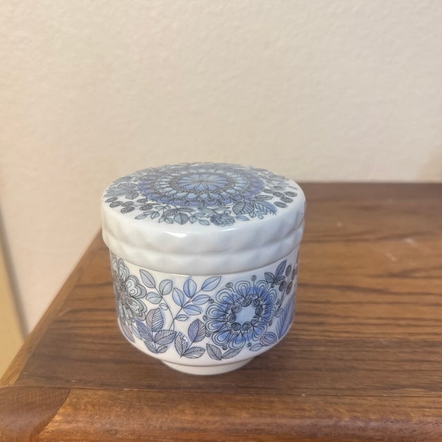 Add a touch of vibrant retro charm to your table setting with this striking mid-century modern lidded sugar bowl. Crafted...