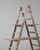 This 20th Century French A-frame ladder shelf showcases the perfect blend of rustic utility and decorative charm....