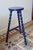 Tripod stool in wood with turned legs, entirely painted in deep blue. Its slender and decorative silhouette makes it ideal...