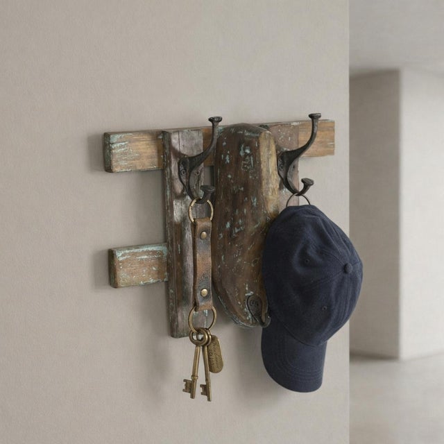 Transform your home with a piece that whispers stories of the past. Our Rustic Shoe Mold Wall Hook is more than just a...