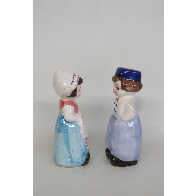 Mid 20th Century Dutch Boy and Girl Ceramic Salt and Pepper Shakers Hand Painted - Set of 2 For Sale - Image 4 of 13