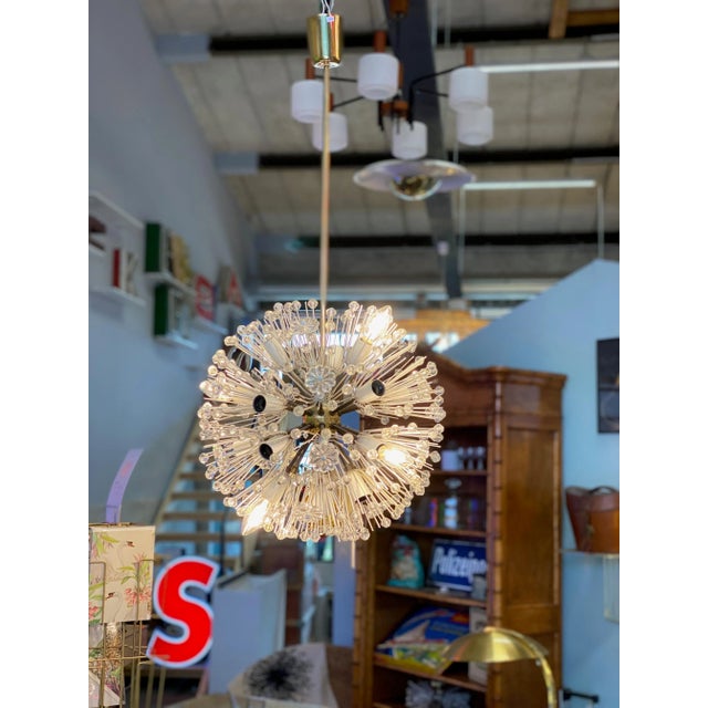 This charming chandeliers designed designer Emil Stejnar in the 1950s for the Vienna lighting manufacturers Rupert Nikoll....