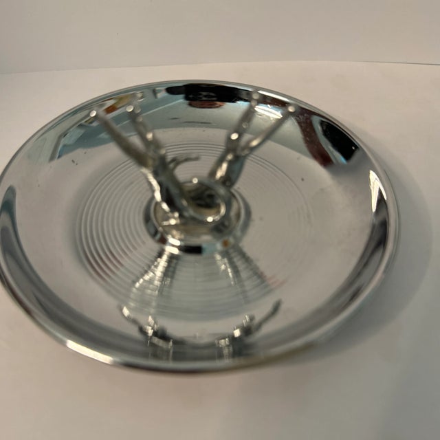 This sparkling Chrome Gator catchall/ashtray is a vintage looker.