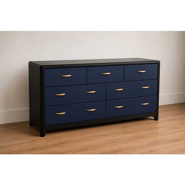Make a statement with this beautifully refinished vintage 9-drawer dresser, thoughtfully updated in a rich navy blue...