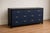 Make a statement with this beautifully refinished vintage 9-drawer dresser, thoughtfully updated in a rich navy blue...