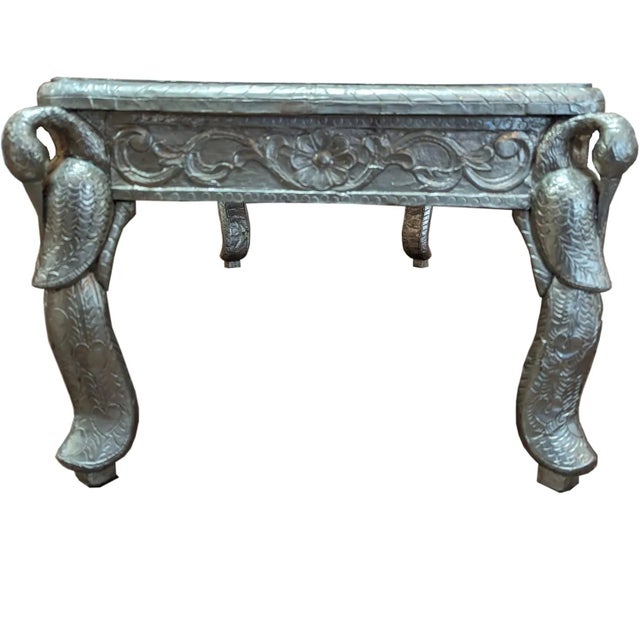 Step into a world of regal splendor with this breathtaking Vintage Hand Carved Metal Cladded Silver Maharaja Coffee Table....