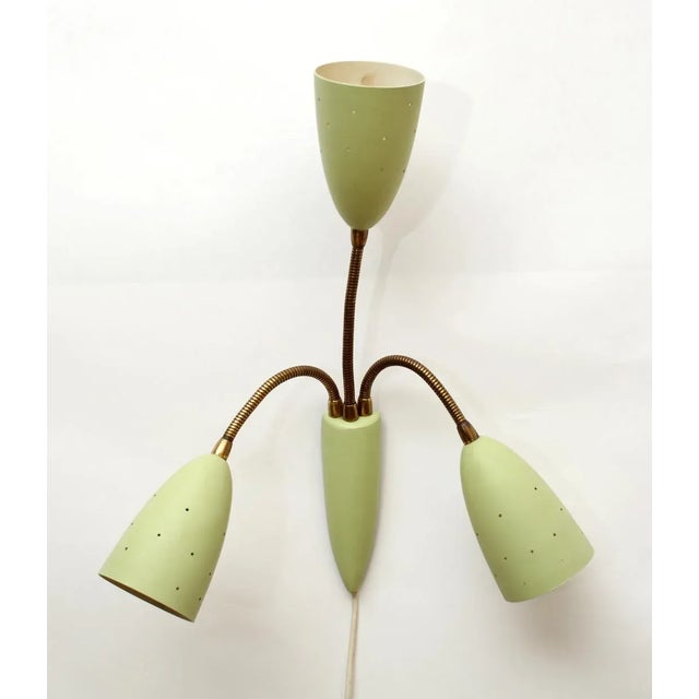 50's wall lamp 3 flame (large thread E27). Painted metal in lime green, shade diameter 10cm, with ''star holes''. Flexible...