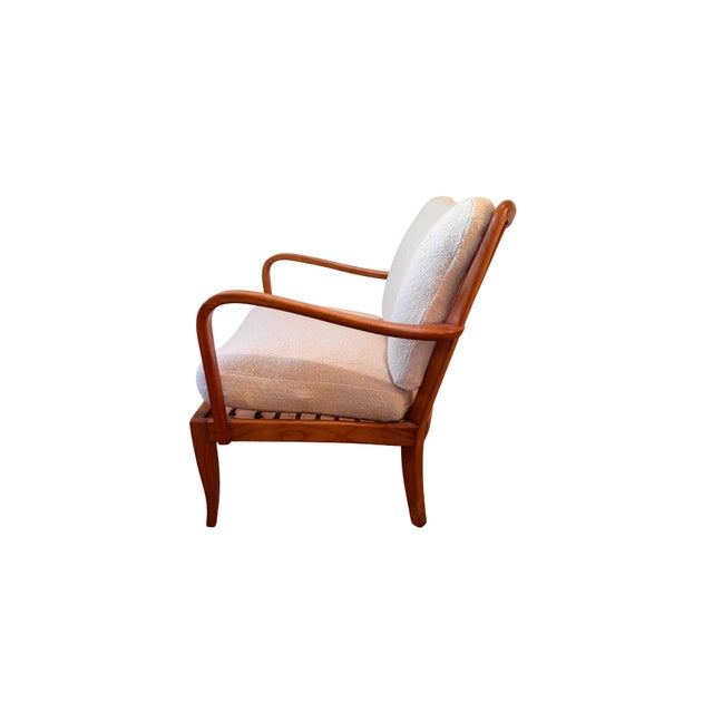 Authentic vintage Knoll lounge chair featuring the original Knoll Antimott D.R.P. metal tag and beautifully sculpted solid...
