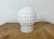 Vintage industrial ceiling or wall light made in former Czechoslivakia during the 1970s. It features a white porcelain...