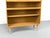 High-quality, two-part cabinet in a minimalist Scandinavian design. The lower section features a shelf with an adjustable...