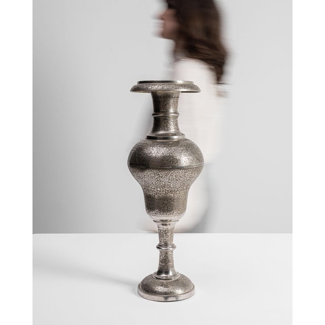 This mid 20th century vase from France is finished in silver. Its form follows honest, well-proportioned lines typical of...