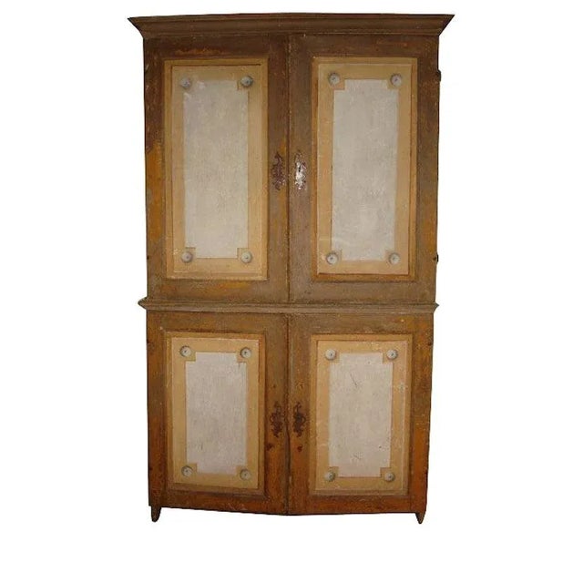 Large antique Italian Theatre canvas armoire cupboard with 34 drawers. Doors of the cupboard feature decorative...