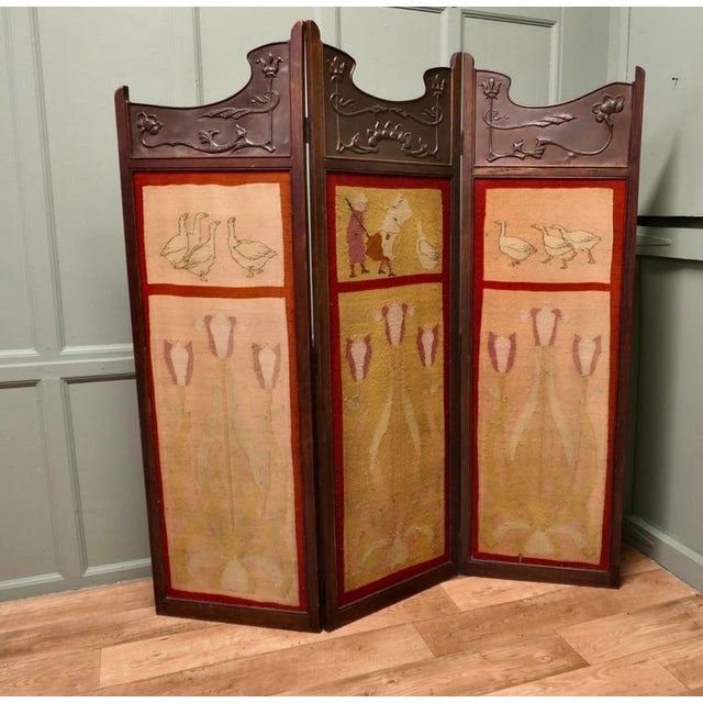 Art Nouveau Copper & Oak 3 Fold Screen Naive Wool Panels This piece is being offered from a dispersal sale of Arts and...
