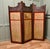 Art Nouveau Copper & Oak 3 Fold Screen Naive Wool Panels This piece is being offered from a dispersal sale of Arts and...