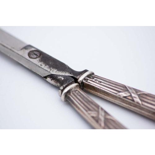Scissors with Embossed Silver Handles, in Very Good conditions. Designed from 2000 This piece has an attribution mark, I...