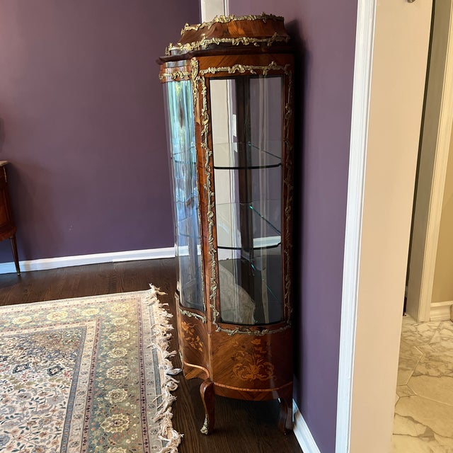 French 19th century antique vitrine ( curio cabinet) with bronze doré accents, intricate floral wood inlays. Exquisite...