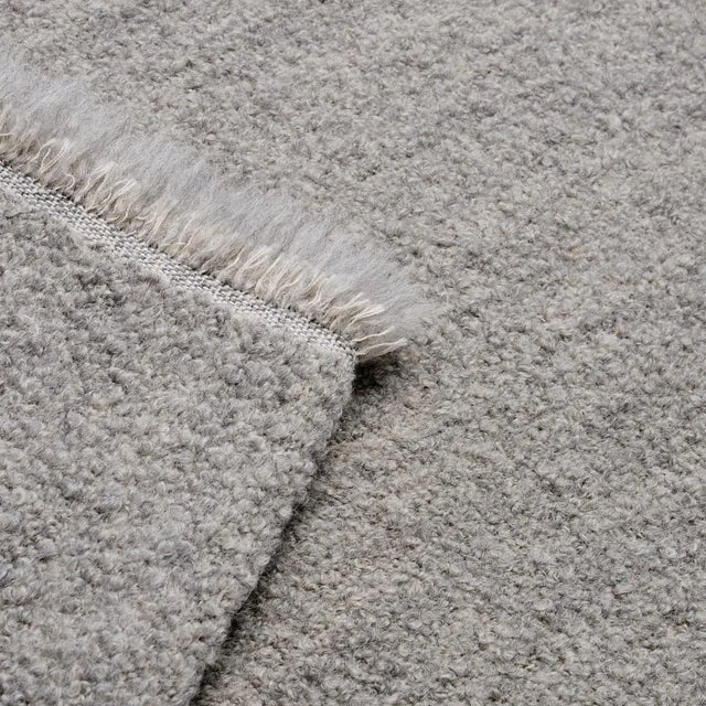 Woven in Italy, Oskar Alpaca Wool Bouclé derives its ultra-soft texture from a luxe blend of Peruvian alpaca, virgin wool...