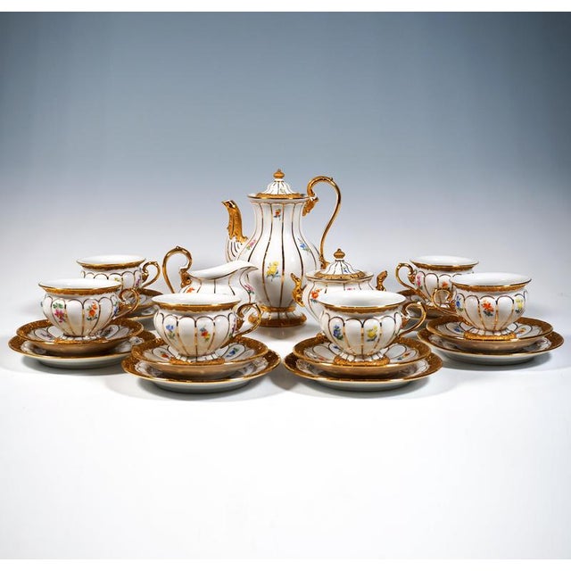 Meissen service, consisting of 21 parts: mocha pot with lid, creamer, sugar urn, six cups, six saucers, six dessert...