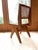 The PHANTOM HANDS Armless Dining Chair is made from solid teak with a natural cane seat and back, with superior...