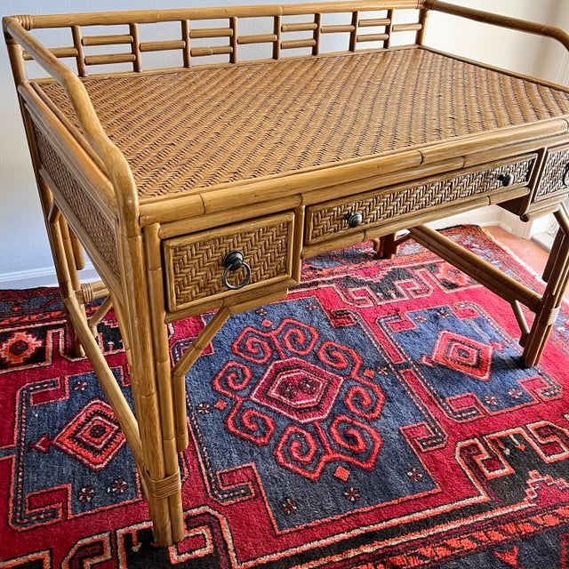 Vintage island style desk. Bamboo & rattan. Three drawer Dimensions: 46"W x 28"D x 34.75"H