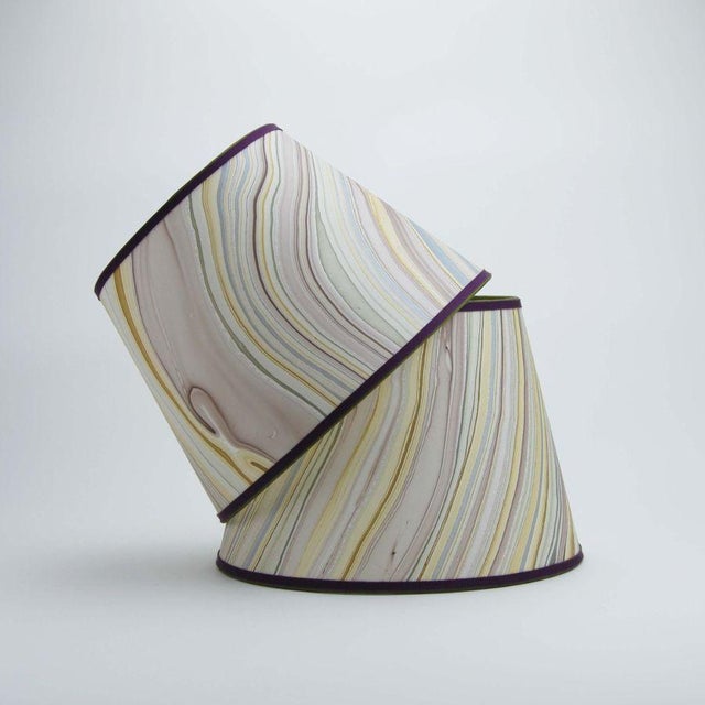 Marbled paper in a sophisticated stration of mauve, gold and stone; trimmed in two colors of grosgrain. Available in 3...