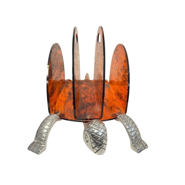 Vintage Arthur Court turtle magazine holder featuring a tortoise / amber-colored lucite shell and cast aluminum legs,...