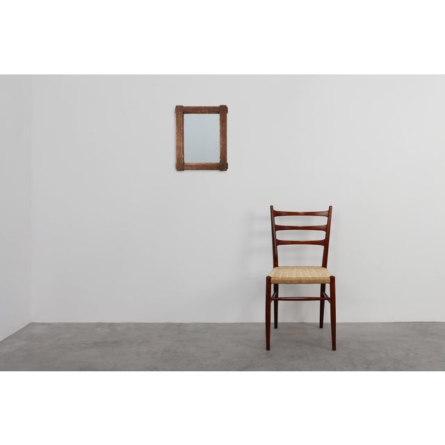 A beautifully authentic early‑19th‑century French wall mirror crafted in solid oak, distinguished by its rustic character...