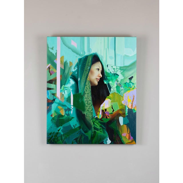 The artwork features a serene profile of a woman enveloped in vibrant shades of turquoise and green, creating a sense of...