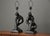 A pair of mid century modern sculptural black sillouite table lamps with an organic form by Leo Middleman for...