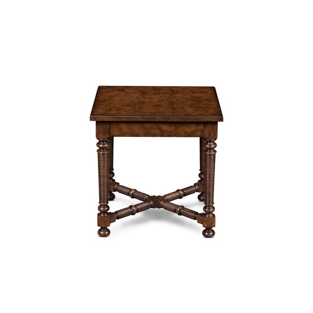 This hand-finished side table reflects devotion to artistry in form and detail. The richly grained oak burl top rests upon...